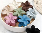 Pack of 4 Matte Flower Hair Claw Clips – Trendy Plumeria Floral Hair Accessories for Women & Girls