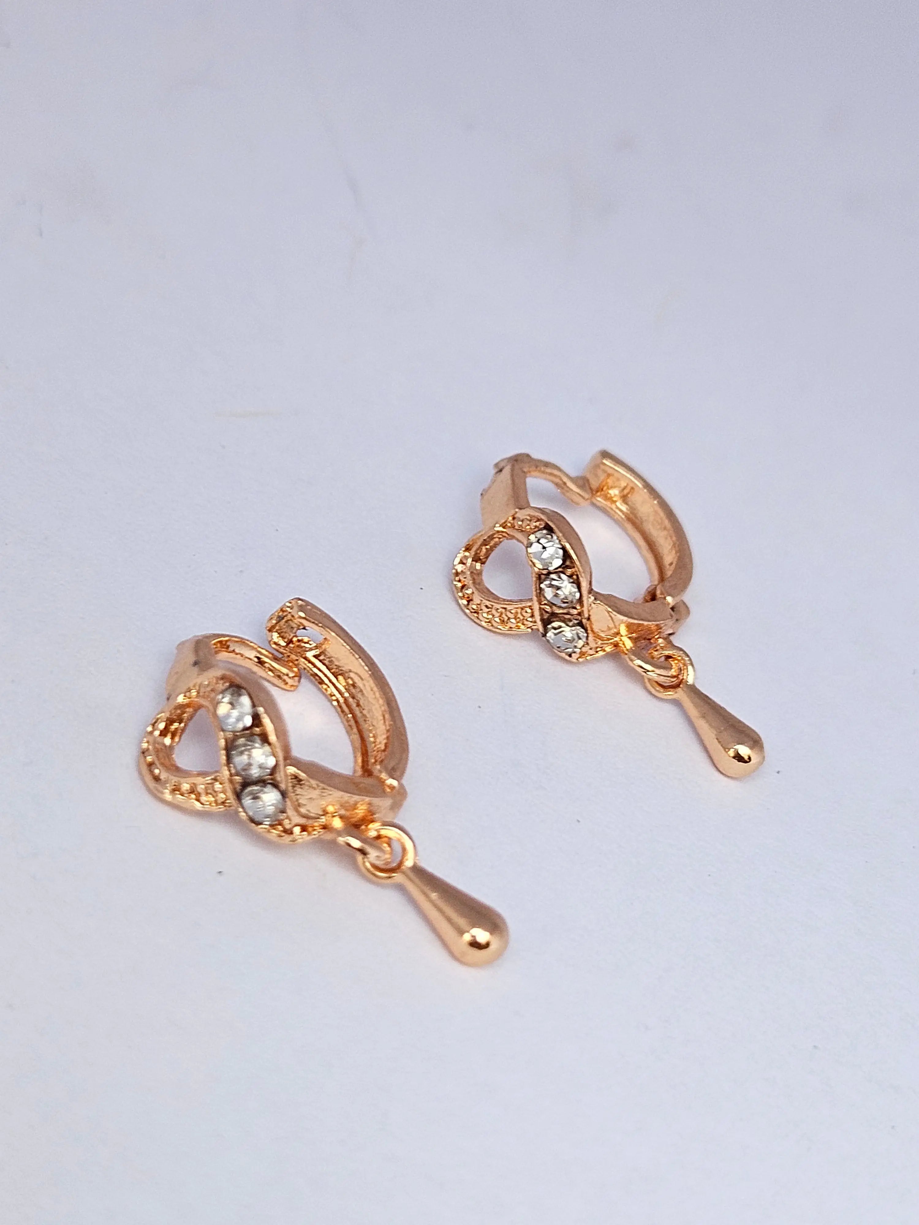 Infinity Twist Golden Hoop Earrings with Delicate Teardrop Charms – Modern Lightweight Dangle Hoops for Women